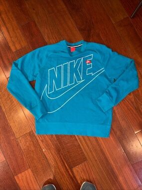 Nike woman’s Bright Teal big spell Crewneck Sweatshirt
